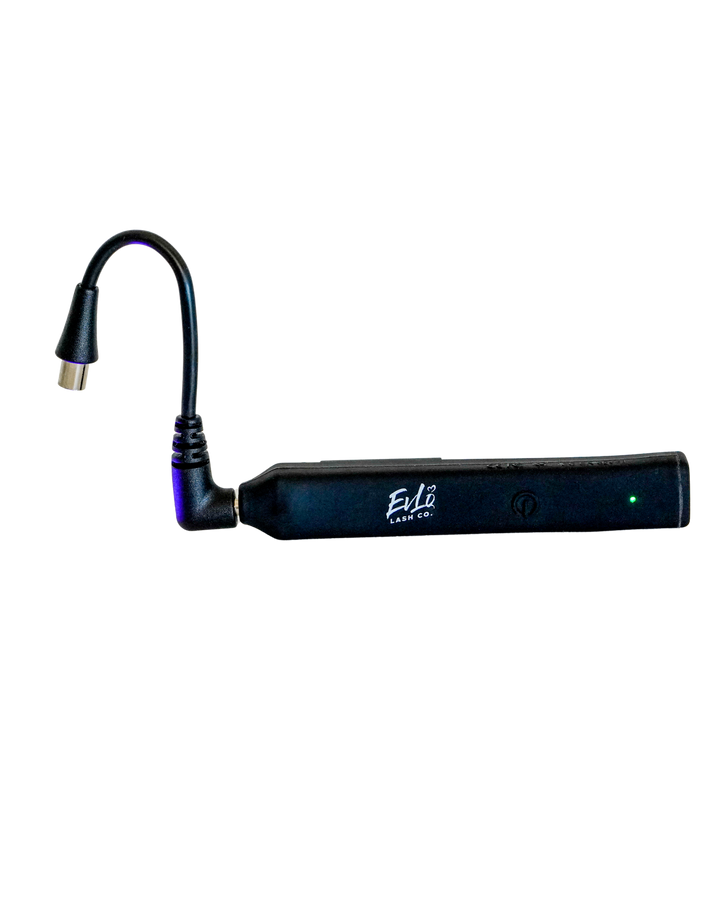 Halo Tweeze: Halo Tweeze device, angled top view, gooseneck light head raised, transparent cutout (lock-ready)