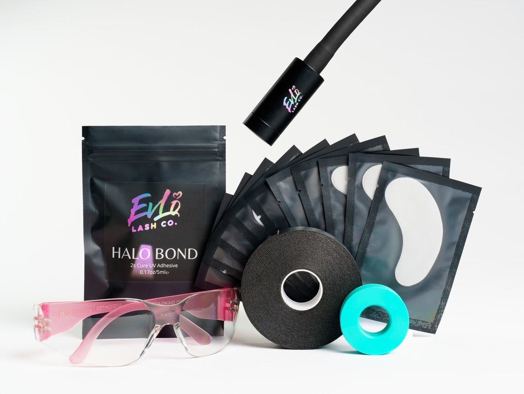 Halo UV light: Halo UV light kit laid out: light head, Halo Bond pouch, gel tape roll, eye pads, pink eye protection